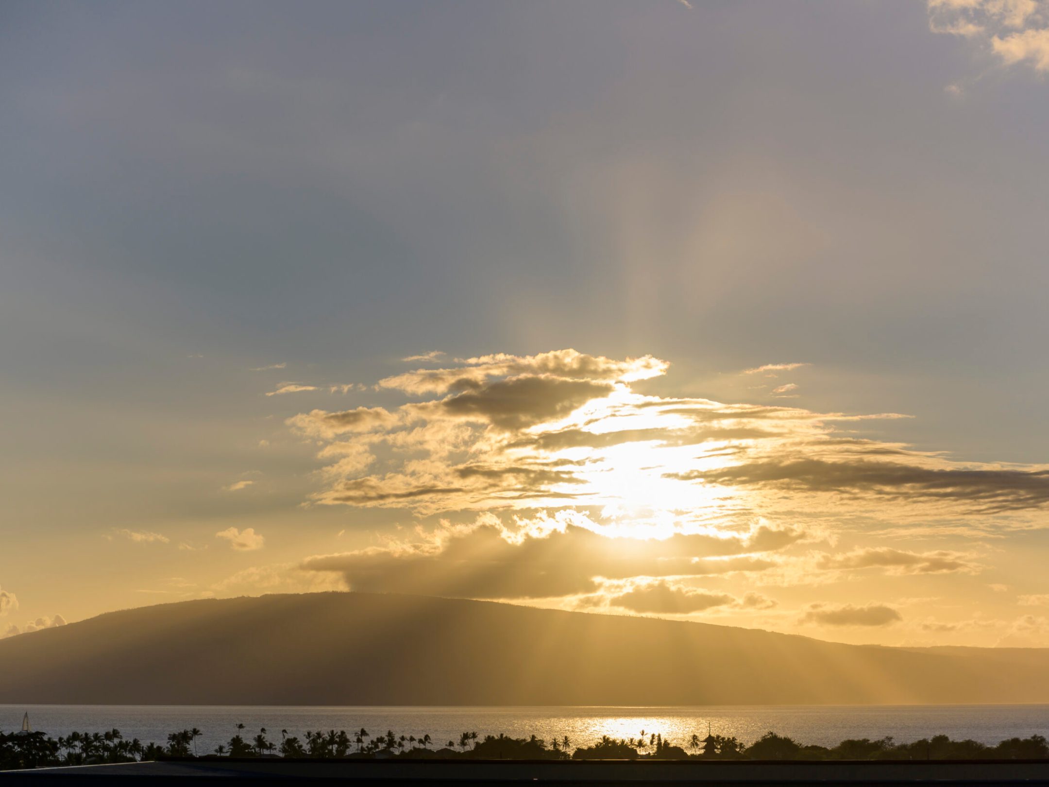 a sunset over a body of water
