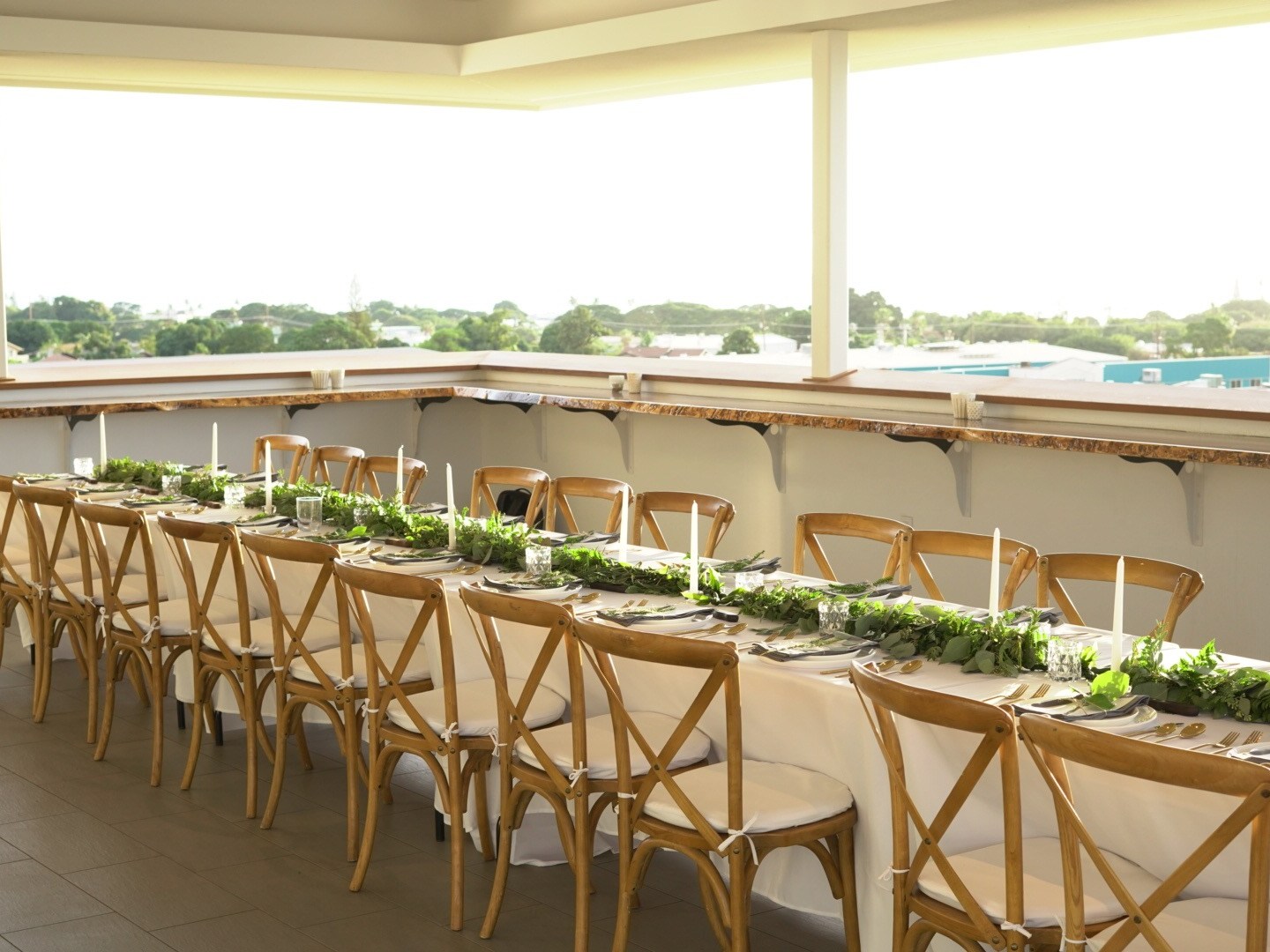 a row of wooden benches sitting on top of a table