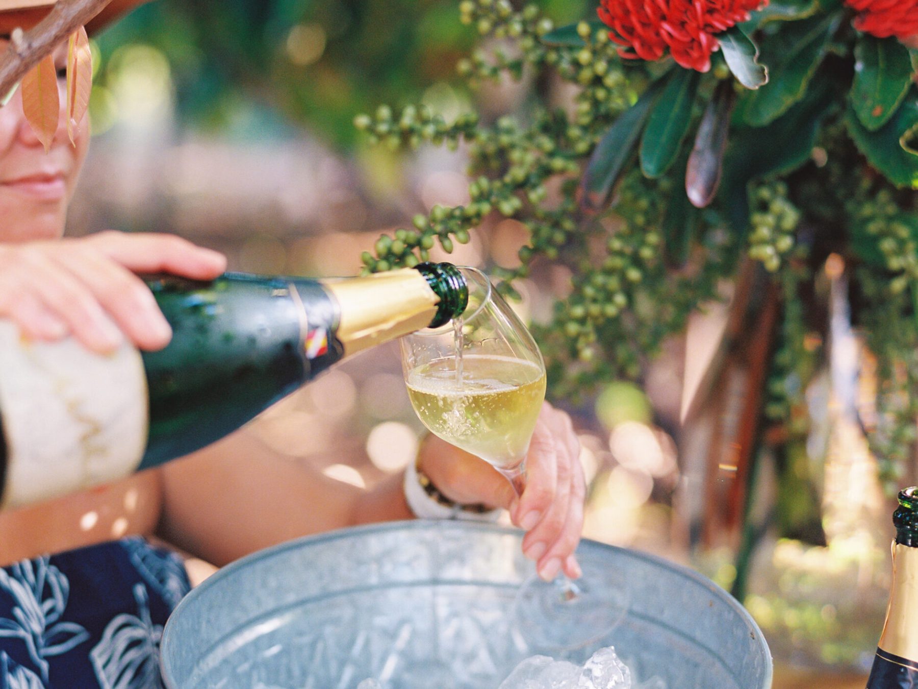 a person holding a bottle