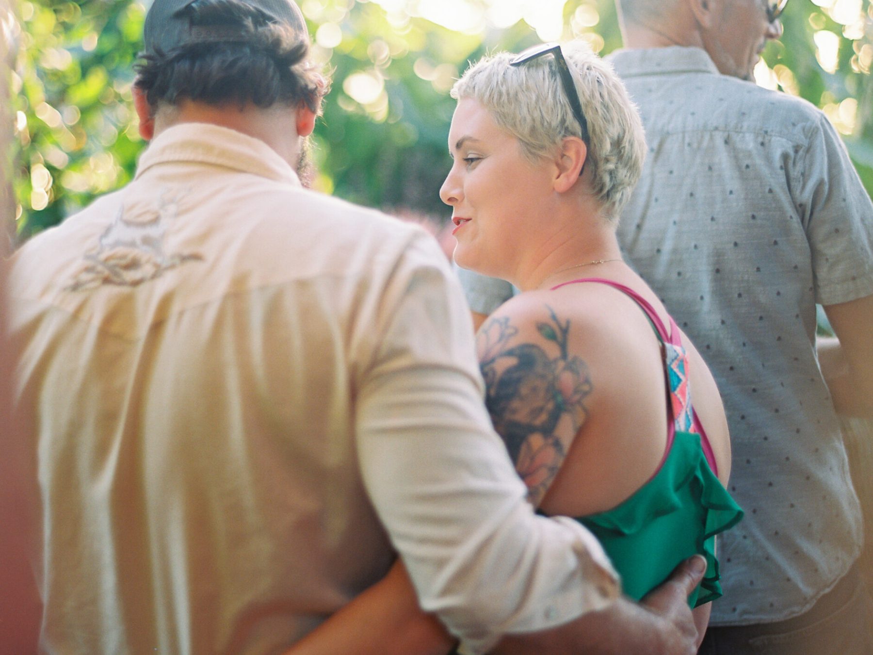 a group of people standing next to a person
