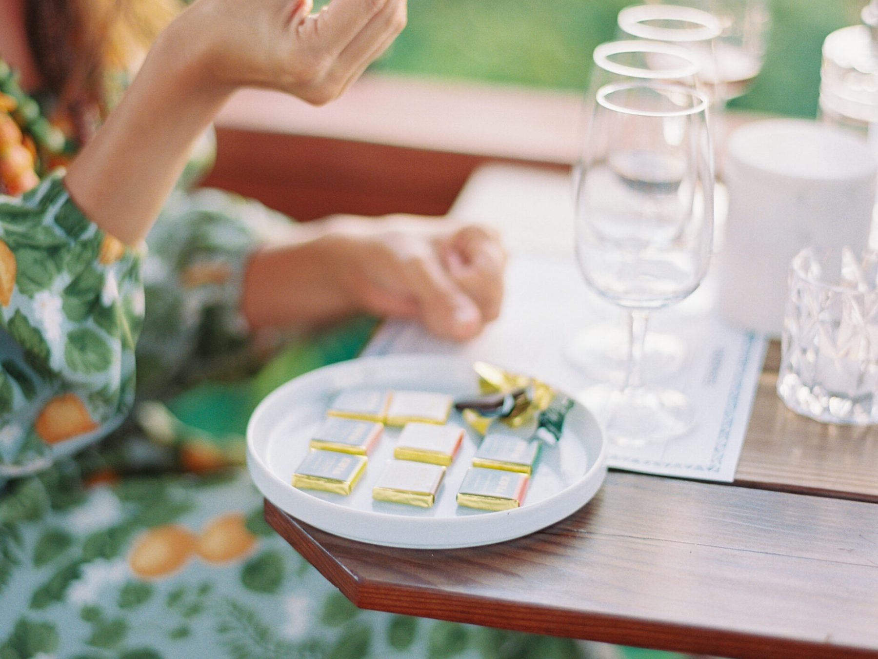 a woman sitting on a table