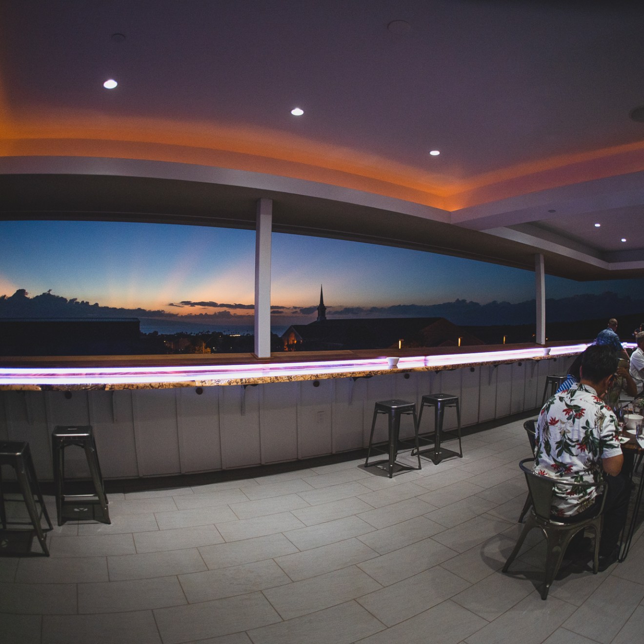 a group of people standing on top of a ramp