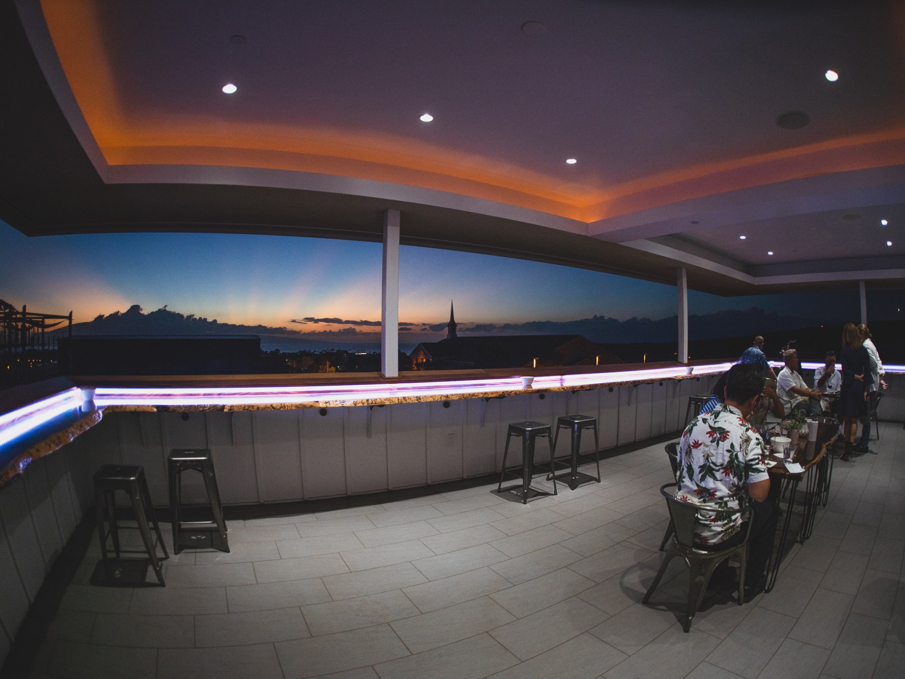 a group of people standing on top of a ramp