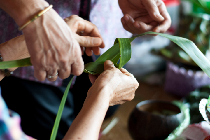 a close up of a person cutting into a cake